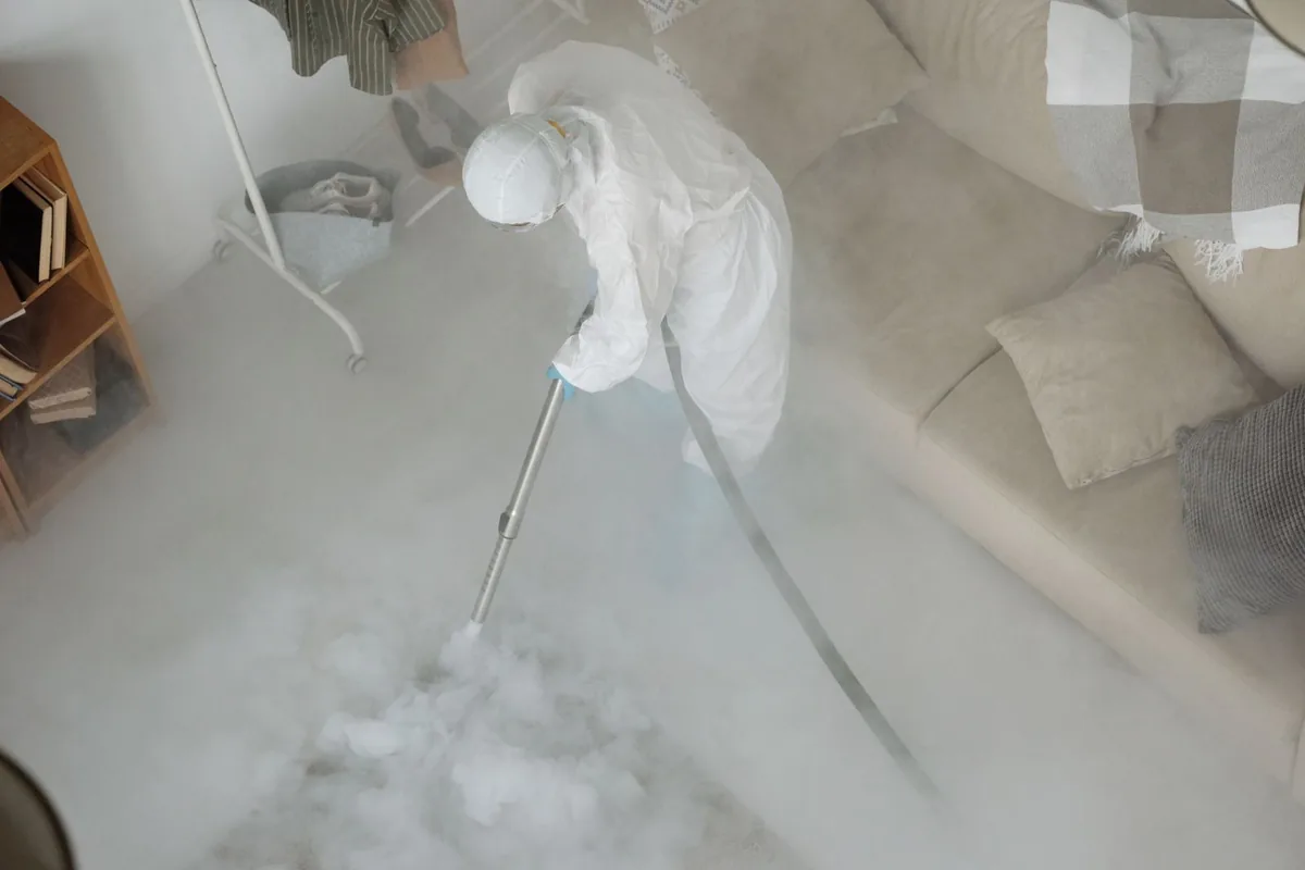 Biohazard cleanup technician in protective equipment, Muskego, WI